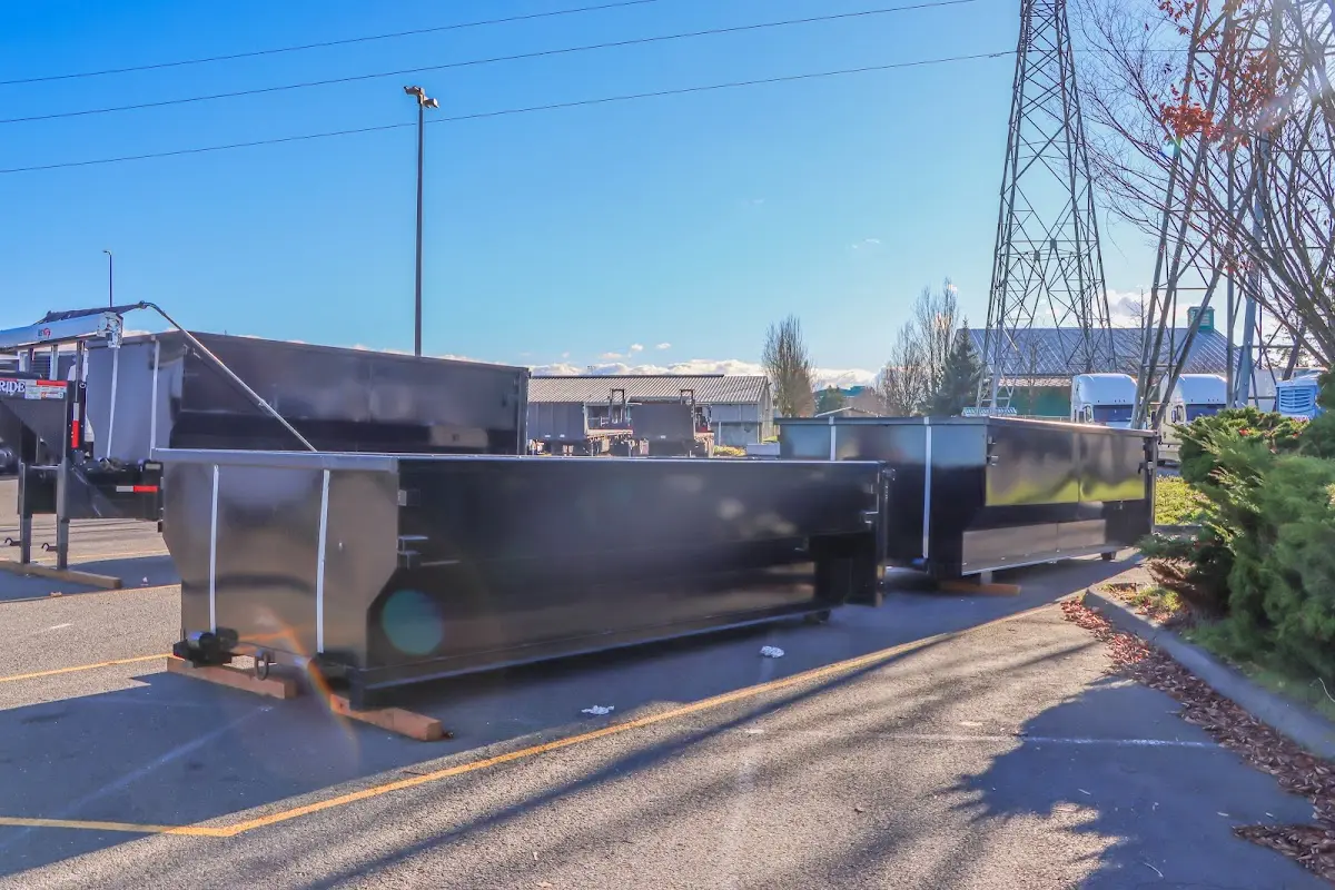 Roll-off dumpster ready for waste disposal at job site for 2 Yard Dumpster Rental in Hollis